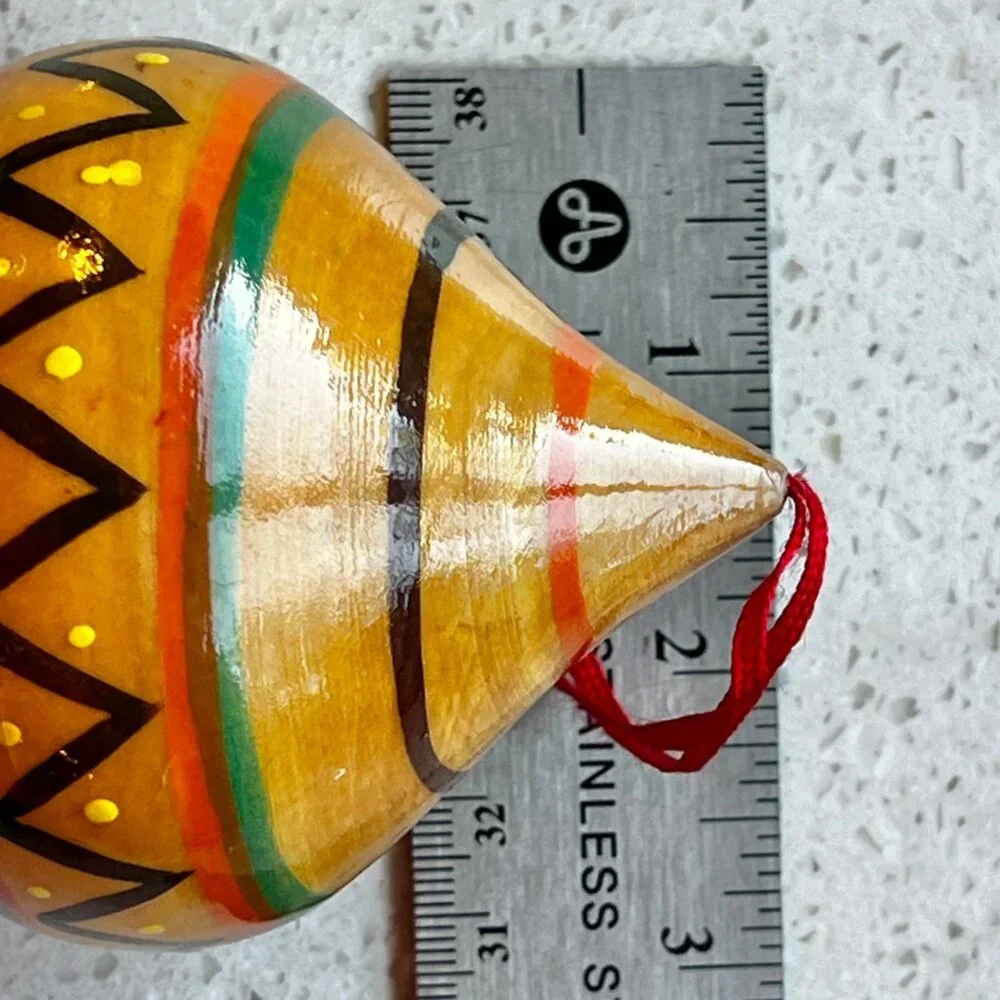 Handcrafted Wooden Hanging Ornament With Vibrant Tribal Patterns